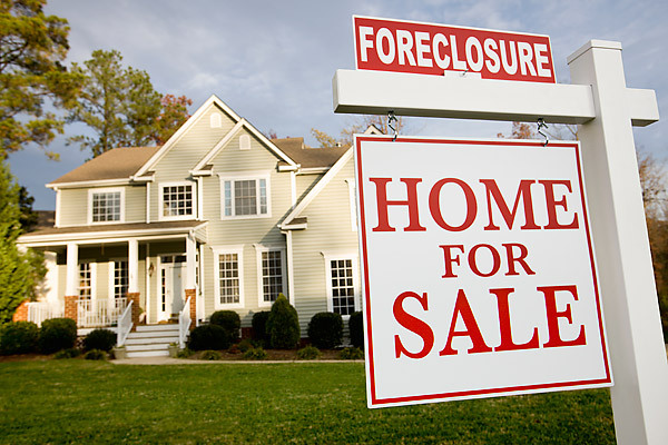 Why do people go through foreclosures?